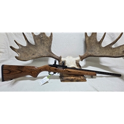 U1022HB Pre-Owned Ruger 10/22 20" Hammer forged heavy barrel, laminate stock with gun case & accessories. Condition - Excellent