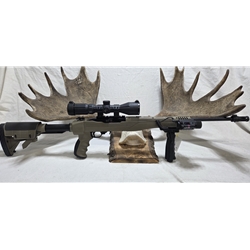 U1022ATISTCK Pre-Owned Ruger 10/22  22 LR with ATI folding stock, lazer/ flashlight, UTG TF2 Armored 3-12x40 red/green reticle & box with original stock. Condition - Very Good